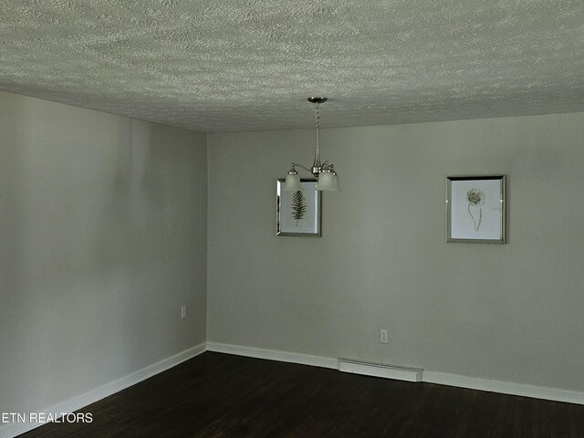 335 Bristol Rd, Harrogate, TN 37752 - unfurnished room with a textured ceiling, a chandelier, dark wood-style flooring, baseboards, and a baseboard radiator