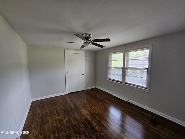 335 Bristol Rd, Harrogate, TN 37752 - empty room with ceiling fan, dark wood-type flooring, and baseboards