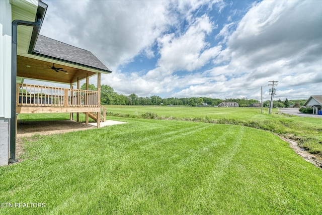 27 Jesse Loop, Crossville, TN 38555 - view of grassy yard featuring ceiling fan and a wooden deck
