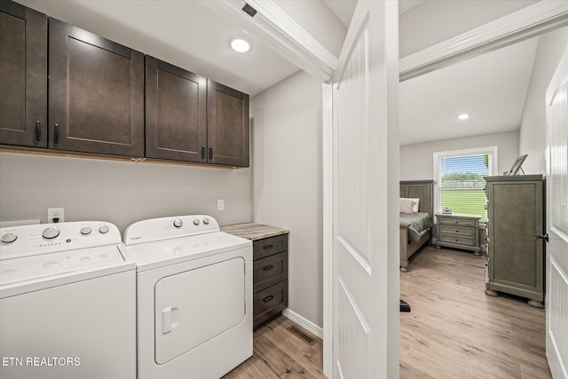27 Jesse Loop, Crossville, TN 38555 - laundry room with cabinet space, independent washer and dryer, light wood-style flooring, baseboards, and recessed lighting