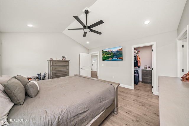 27 Jesse Loop, Crossville, TN 38555 - bedroom featuring light wood-type flooring, vaulted ceiling, a walk in closet, baseboards, and recessed lighting