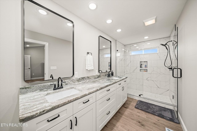 27 Jesse Loop, Crossville, TN 38555 - full bathroom featuring a marble finish shower, double vanity, wood finished floors, and recessed lighting
