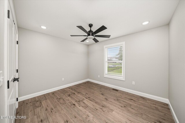 27 Jesse Loop, Crossville, TN 38555 - empty room with a ceiling fan, wood finished floors, baseboards, and recessed lighting