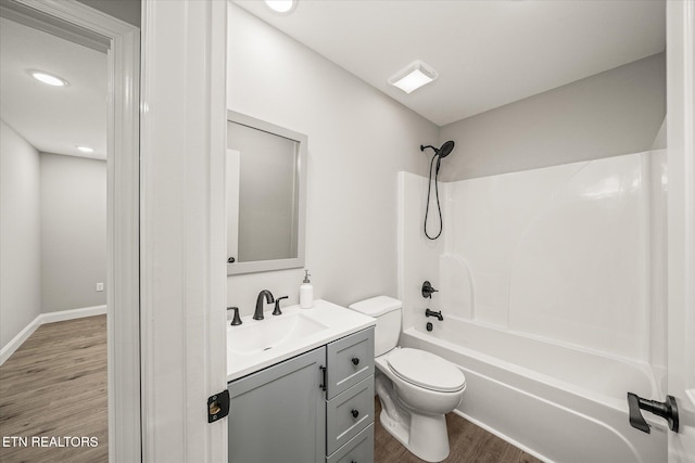 27 Jesse Loop, Crossville, TN 38555 - bathroom with wood finished floors, toilet, vanity, shower / washtub combination, and recessed lighting