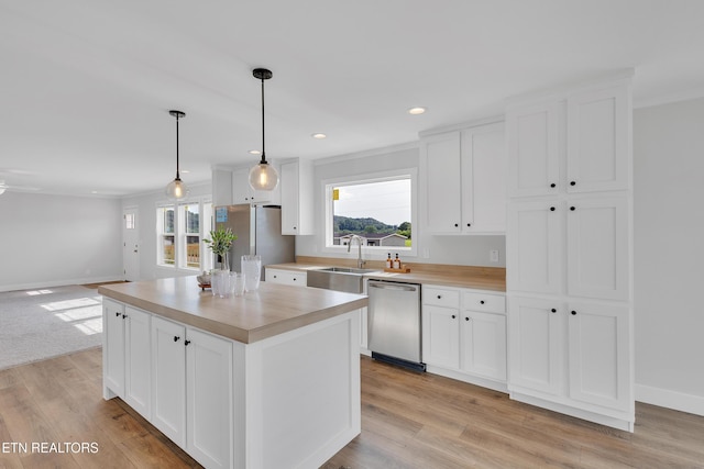1559 River Path, Morristown, TN 37813 - kitchen with a sink, appliances with stainless steel finishes, white cabinets, recessed lighting, and ornamental molding