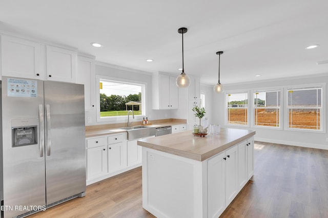 1559 River Path, Morristown, TN 37813 - kitchen featuring appliances with stainless steel finishes, a sink, plenty of natural light, light countertops, and recessed lighting