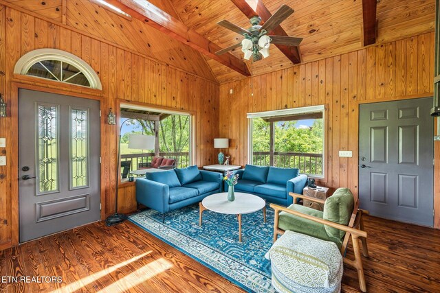 2892 N York Hwy, Pall Mall, TN 38577 - living room featuring beam ceiling, wood finished floors, wood ceiling, wooden walls, and a ceiling fan