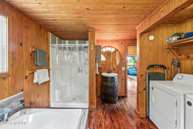 2892 N York Hwy, Pall Mall, TN 38577 - clothes washing area featuring wood ceiling, separate washer and dryer, wood walls, and dark wood finished floors