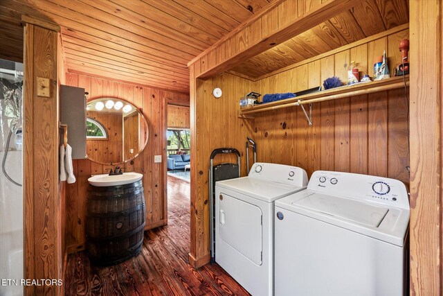2892 N York Hwy, Pall Mall, TN 38577 - laundry area with independent washer and dryer, wood ceiling, dark wood-style flooring, and wood walls