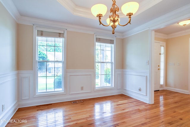 4913 Ivy Rose Dr, Knoxville, TN 37918 - spare room with light wood-type flooring, a chandelier, wainscoting, and ornamental molding