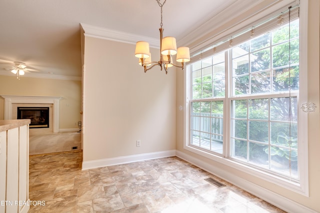 4913 Ivy Rose Dr, Knoxville, TN 37918 - spare room with crown molding, a chandelier, healthy amount of natural light, a ceiling fan, and baseboards