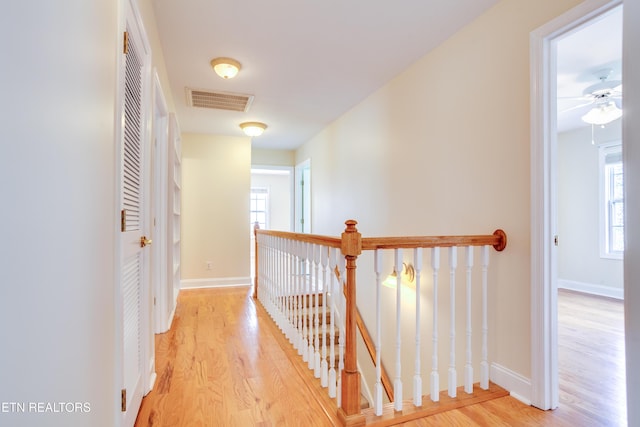 4913 Ivy Rose Dr, Knoxville, TN 37918 - corridor with an upstairs landing, wood finished floors, and baseboards