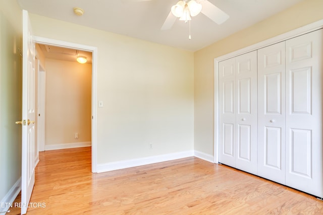 4913 Ivy Rose Dr, Knoxville, TN 37918 - unfurnished bedroom with attic access, light wood-type flooring, a closet, and baseboards