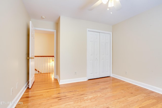 4913 Ivy Rose Dr, Knoxville, TN 37918 - unfurnished bedroom with light wood-style flooring, baseboards, a closet, and a ceiling fan