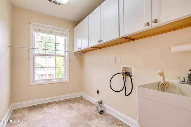 4913 Ivy Rose Dr, Knoxville, TN 37918 - washroom with cabinet space, hookup for a washing machine, electric dryer hookup, and baseboards