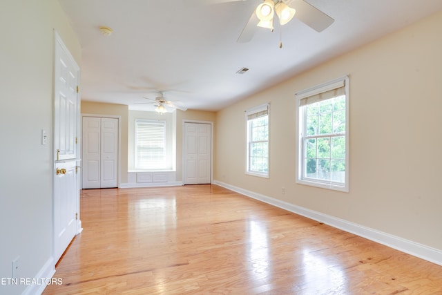 4913 Ivy Rose Dr, Knoxville, TN 37918 - unfurnished room with ceiling fan, light wood-style flooring, and baseboards