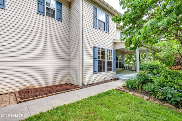 4913 Ivy Rose Dr, Knoxville, TN 37918 - view of side of home featuring a porch