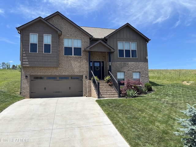 3152 Bridgewater Blvd, Morristown, TN 37814 - raised ranch featuring brick siding, board and batten siding, concrete driveway, a front lawn, and a garage