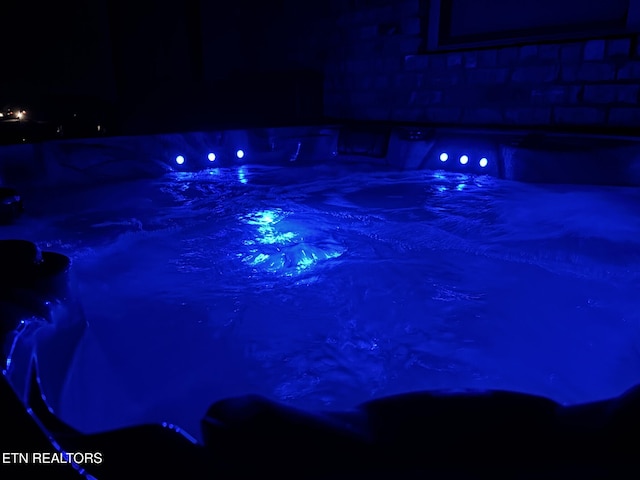 3152 Bridgewater Blvd, Morristown, TN 37814 - pool at twilight featuring a hot tub