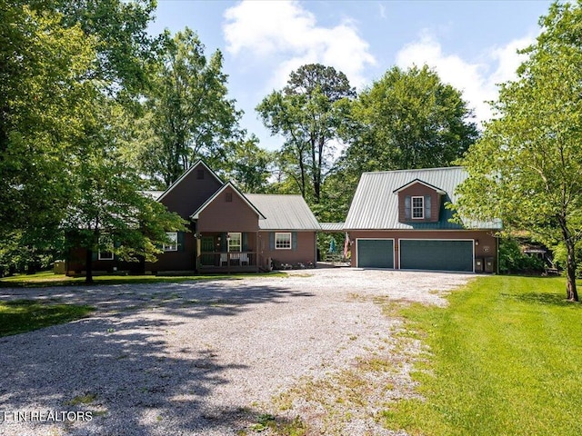 3428 Connie Ln, White Pine, TN 37890 - view of front of property with driveway, a front lawn, and metal roof