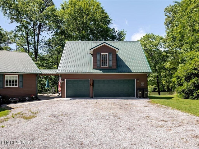 3428 Connie Ln, White Pine, TN 37890 - garage featuring gravel driveway and a detached garage