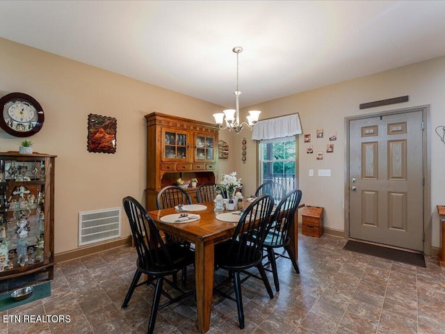 3428 Connie Ln, White Pine, TN 37890 - dining room with a chandelier and baseboards