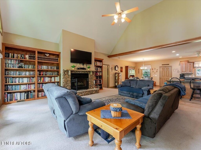3428 Connie Ln, White Pine, TN 37890 - living room with a ceiling fan, light carpet, a fireplace, high vaulted ceiling, and a chandelier
