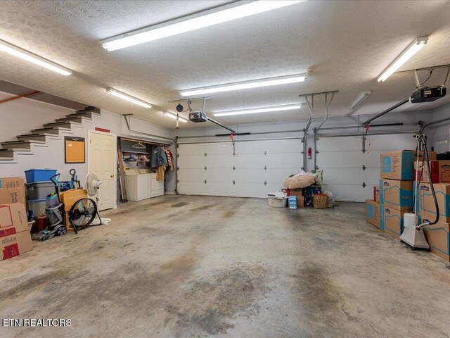 3428 Connie Ln, White Pine, TN 37890 - garage with washer and clothes dryer and a garage door opener