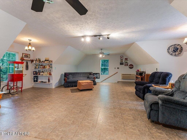 3428 Connie Ln, White Pine, TN 37890 - living room featuring ceiling fan, a chandelier, a textured ceiling, and track lighting