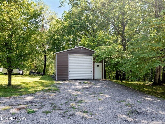 3428 Connie Ln, White Pine, TN 37890 - detached garage featuring gravel driveway