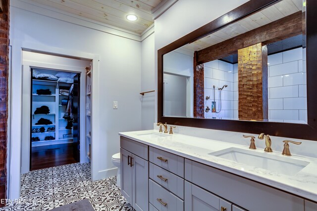 1510 Hickory Pointe Ln, Maynardville, TN 37807 - bathroom featuring a wood ceiling with exposed beams, double vanity, a walk in closet, and a shower