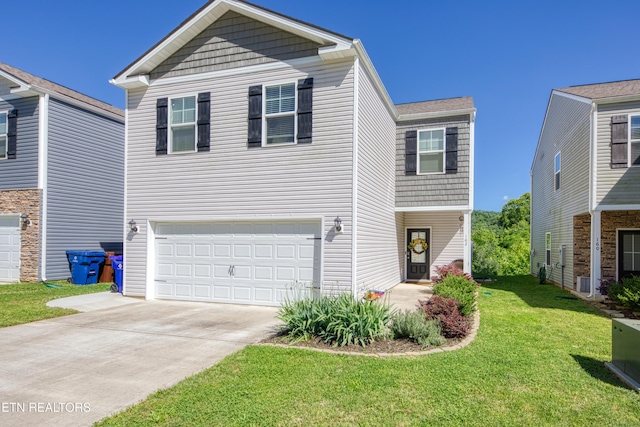 162 Harbour Pointe Ln, Oak Ridge, TN 37830 - traditional home with a front yard, driveway, and an attached garage