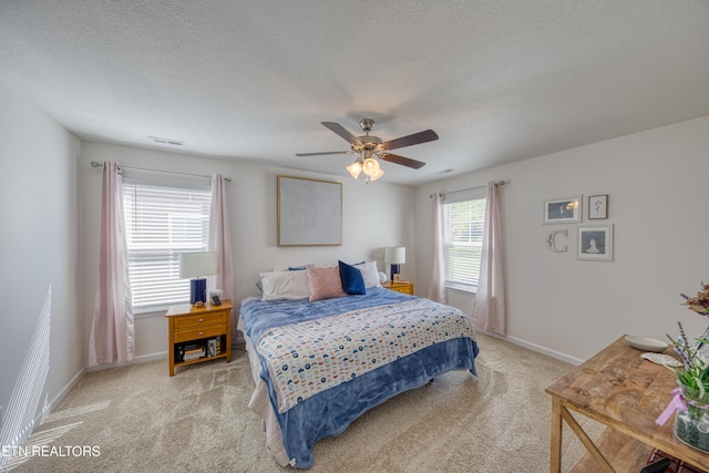 162 Harbour Pointe Ln, Oak Ridge, TN 37830 - bedroom with light colored carpet, a ceiling fan, baseboards, and a textured ceiling