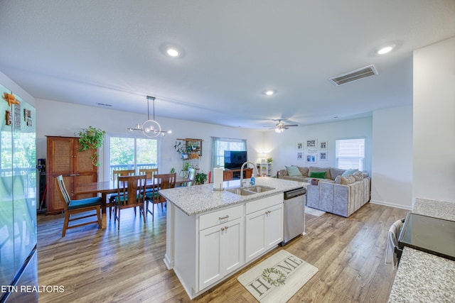 162 Harbour Pointe Ln, Oak Ridge, TN 37830 - kitchen with a sink, dishwasher, light wood-type flooring, healthy amount of natural light, and recessed lighting