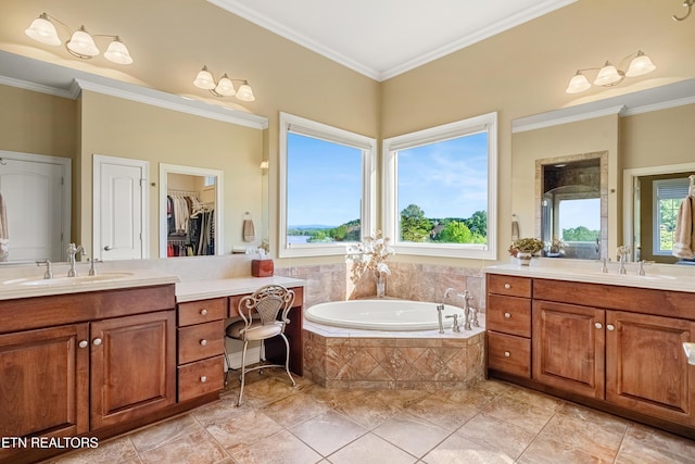 170 Blue Jay Ave, Vonore, TN 37885 - bathroom featuring two vanities, a bath, crown molding, tile patterned flooring, and a walk in closet
