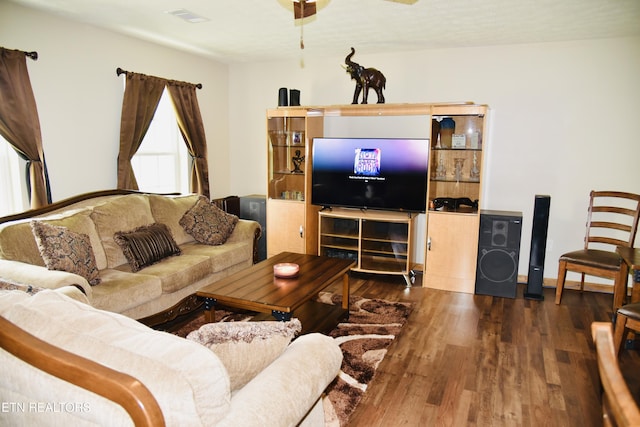 living room with wood finished floors