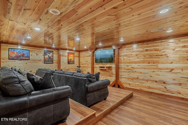 cinema featuring wood ceiling, wood walls, wood finished floors, and recessed lighting