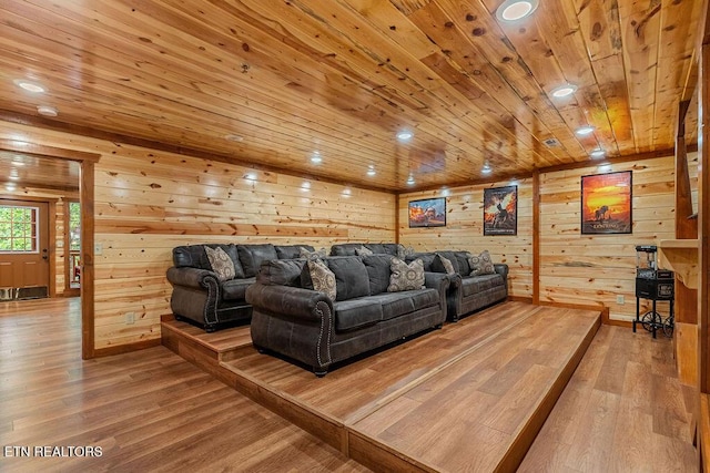 living room with wood ceiling, wood finished floors, wooden walls, and recessed lighting
