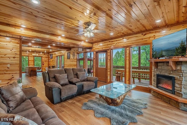living area with wooden ceiling, wood finished floors, ceiling fan, recessed lighting, and a fireplace