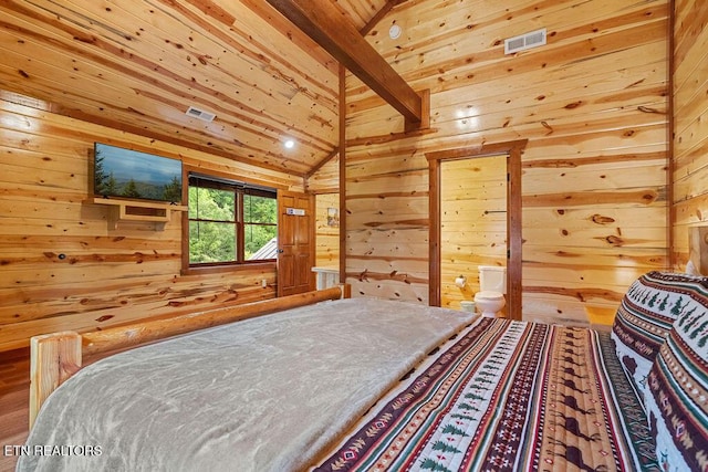 bedroom with wooden walls and wooden ceiling