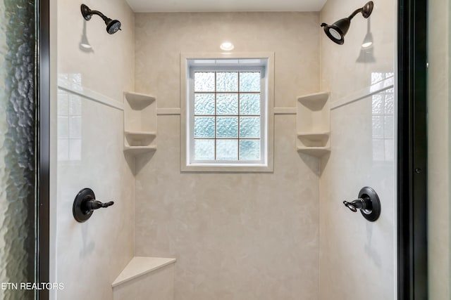 bathroom with a shower