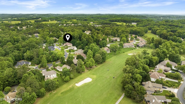 aerial perspective of suburban area featuring a local golf course