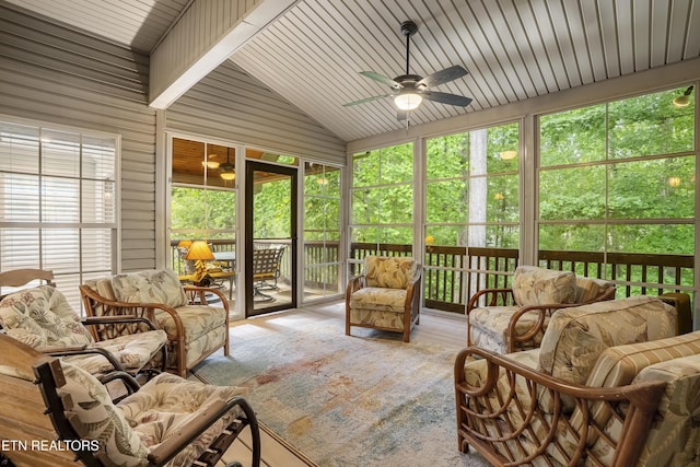 sunroom featuring a ceiling fan and lofted ceiling