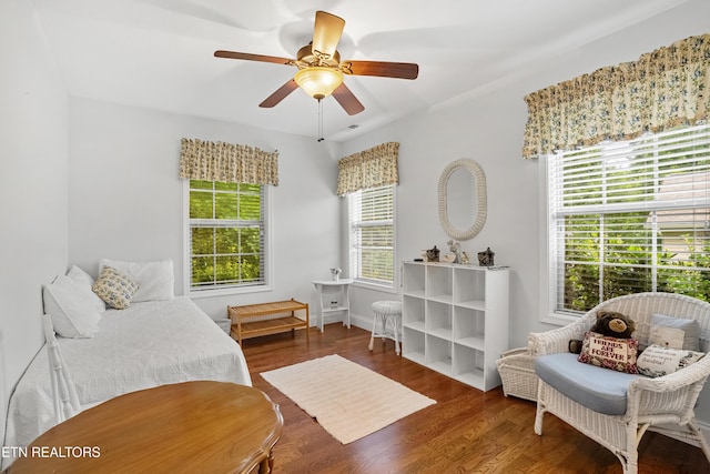 bedroom featuring wood finished floors and a ceiling fan