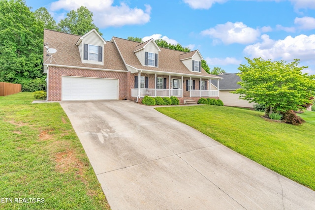 4419 Alder Tree Ln, Knoxville, TN 37938 - new england style home featuring brick siding, a porch, concrete driveway, and roof with shingles
