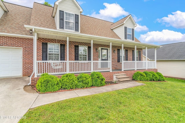 4419 Alder Tree Ln, Knoxville, TN 37938 - cape cod-style house featuring a porch, brick siding, a shingled roof, and a front lawn