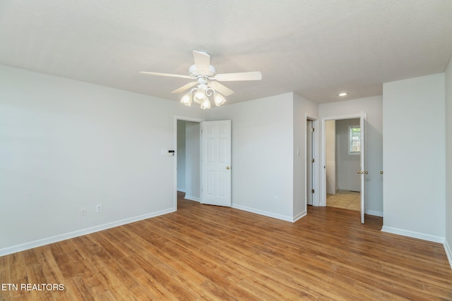 4419 Alder Tree Ln, Knoxville, TN 37938 - unfurnished bedroom featuring light wood finished floors, baseboards, and a ceiling fan