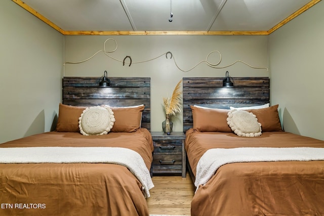 3330 Robeson Rd, Sevierville, TN 37862 - bedroom featuring wood finished floors and ornamental molding