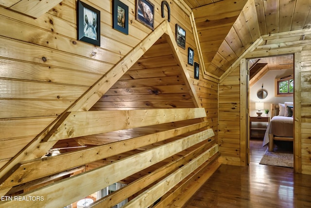 3330 Robeson Rd, Sevierville, TN 37862 - staircase featuring wooden walls, wood ceiling, vaulted ceiling, and wood-type flooring