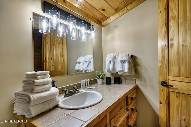 3330 Robeson Rd, Sevierville, TN 37862 - bathroom featuring wooden ceiling, vaulted ceiling, and vanity